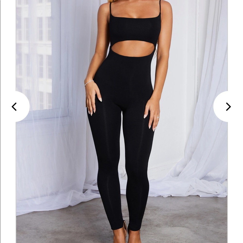 Brand new cut out jump suit M